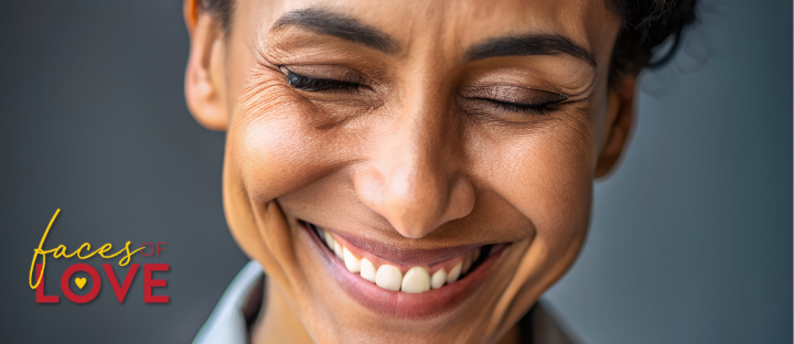A radiantly smiling woman - a face exuding Love.